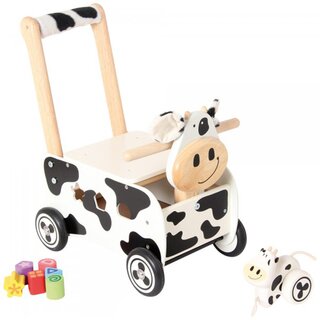 Schiebewagen aus Holz im  Kuh-Design, schwarz-weiß